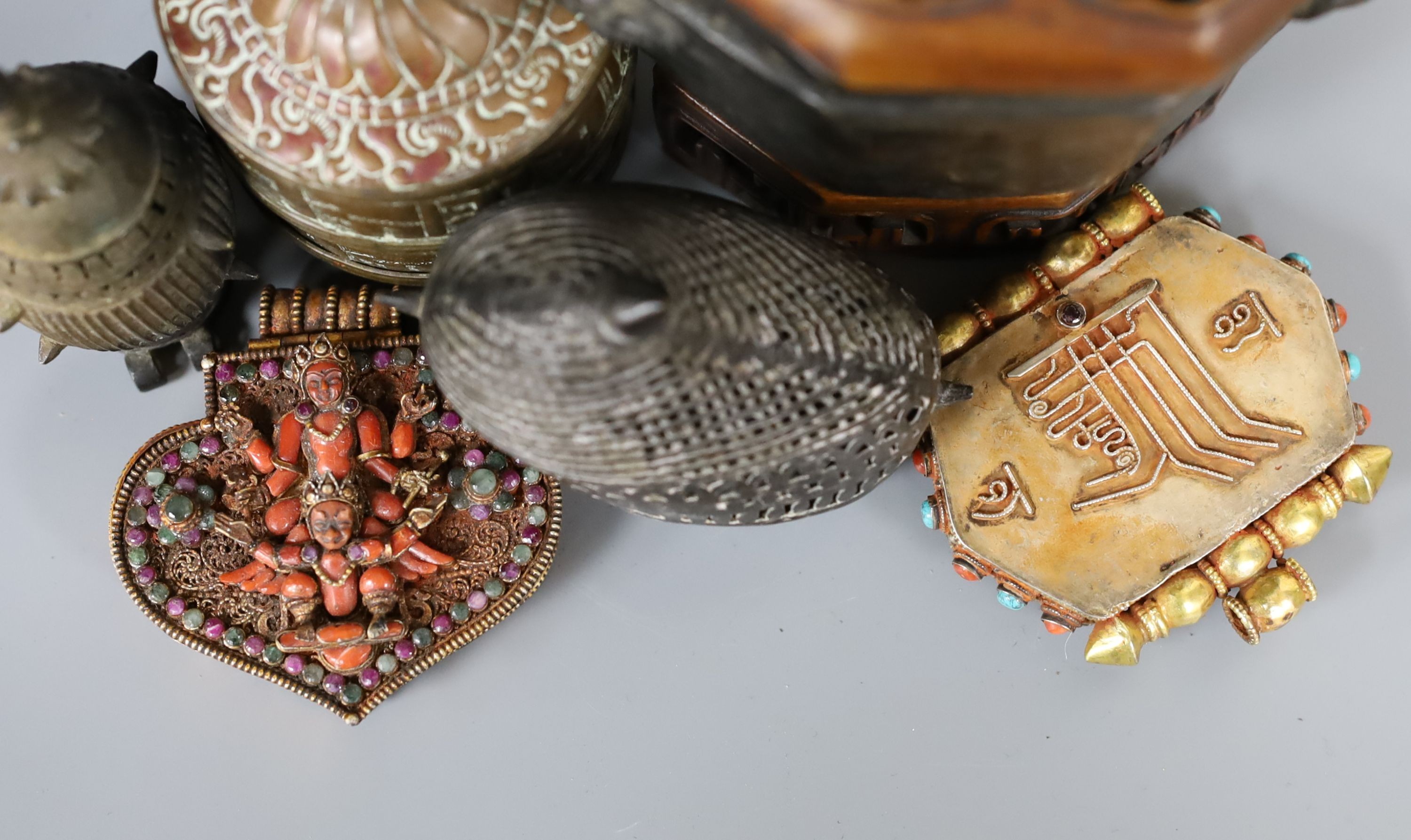 A group of Chinese and Himalayan bronze and metal vessels and objects